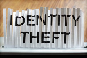 Identity theft Written on Shredded Paper